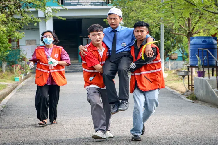 Students practising mock drill in a school in Imphal