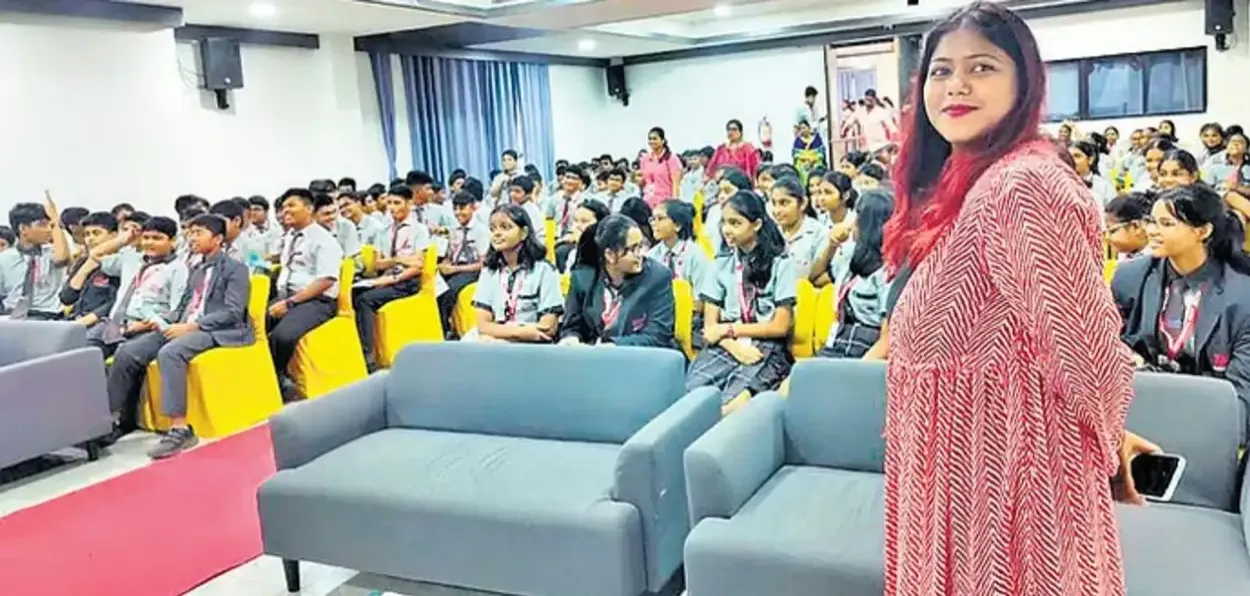 Swati Das speaking at a programme in a school
