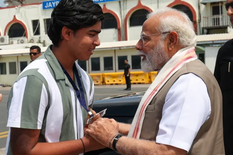 Prime Minister Narendra Modi with cricketing prodigy Vaibhav Suryavanshi at Patna Airport