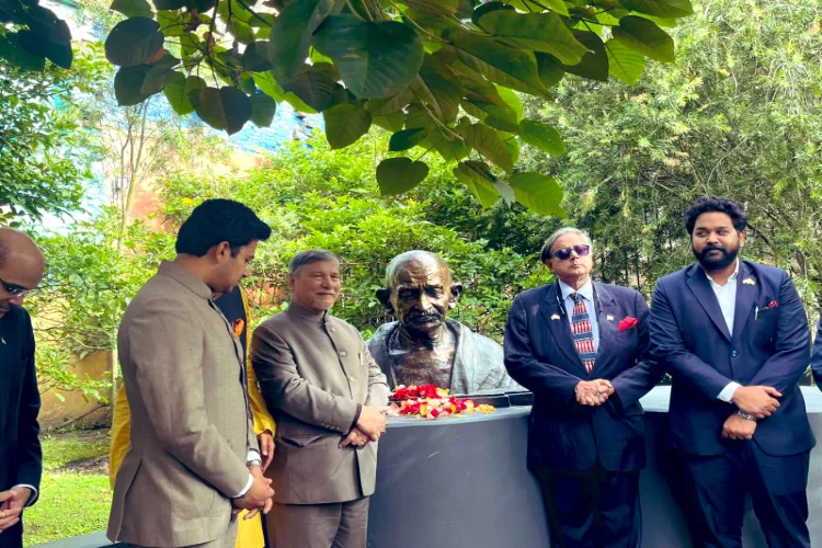 Shahsi Tharoor and others members of the Indian all-party delegation paying tributes to Mahatma Gandhi's bust at the Bagota University