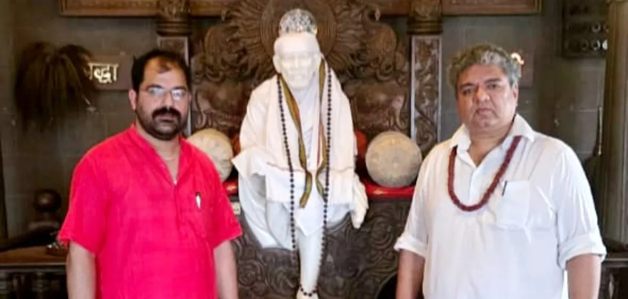 Firdous Baba (left) with 