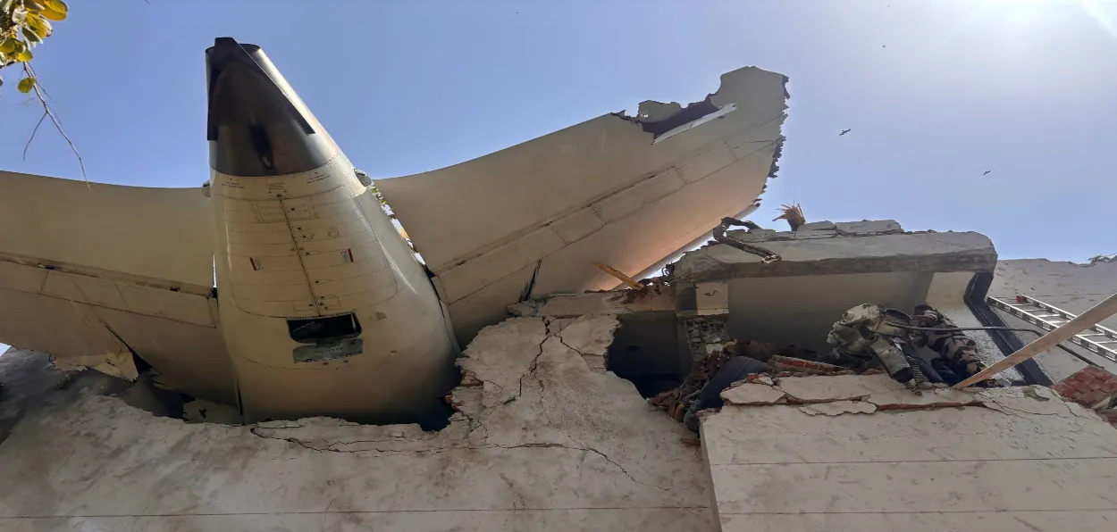 Crashed Air India plane's nose jetting out of the Medical college hostel building (Courtesy: CISF's  X handle)