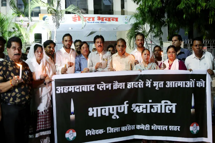People praying for victims of Ahmedabad air crash  in the city