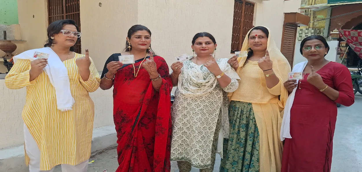 Transgenders voters showing finger mark after casting their votes in elections at a booth in Udaipur, Rajasthan