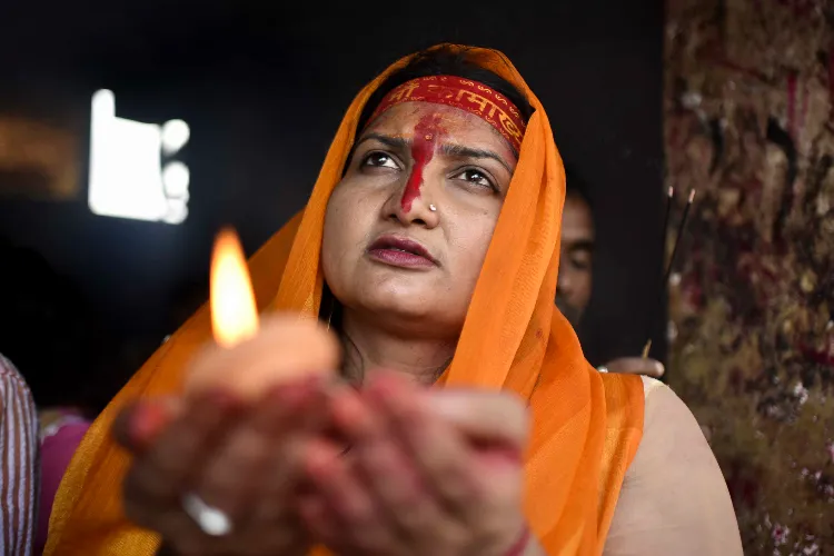 A devotee worshipping at the temple