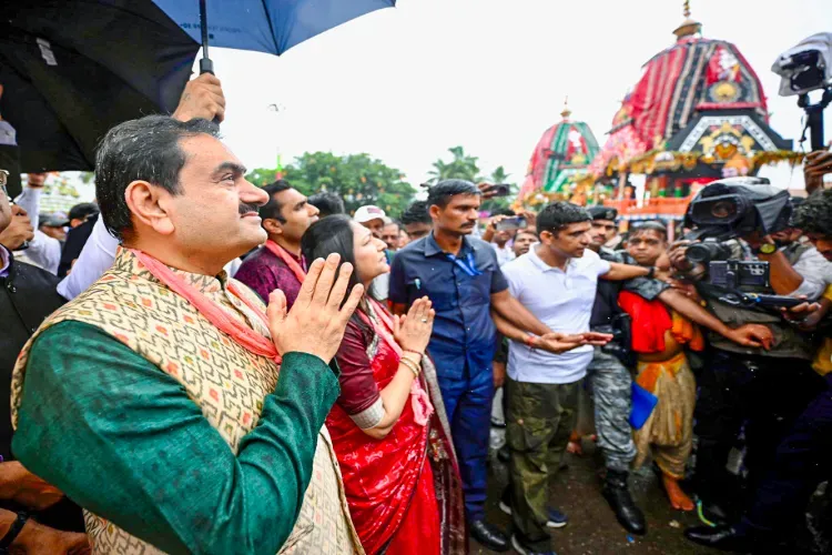Adani Group Chairperson Gautam Adani with his wife Priti Adani seek blessings during the annual Rath Yatra of Lord Jagannath and His siblings, 