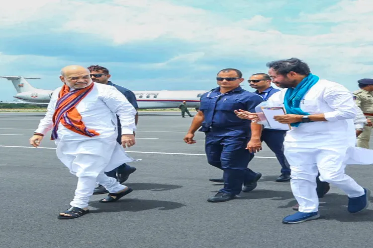 Amit Shah being received by Union Minister and Telangana BJP President G. Kishan Reddy upon his arrival in Hyderabad.