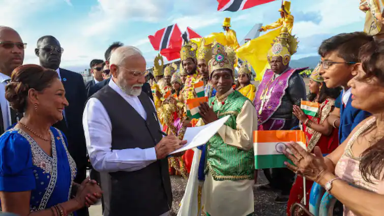 PM of Trinidad and Tobago Kamla Persad-Bissessar with PM Narendra Modi