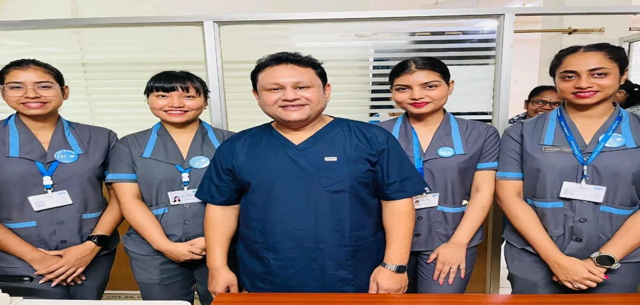 Dr Pervez Uber with his staff