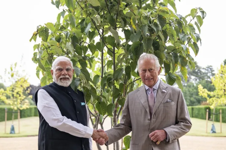 King Charles receiving a tree to be planted this Autumn inspired by the environmental initiative launched by the Prime Minister, “Ek Ped Maa Ke Naam”