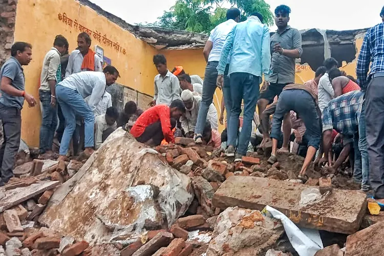 Rescue workers at the site of collapsed school building at Jhalawar, Rajasthan