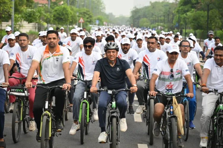 Cyclists participating in Fit India cycling event in Delhi