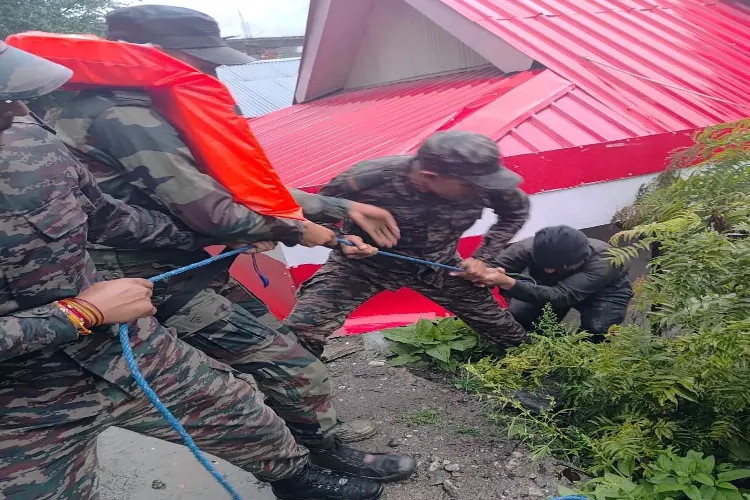 Army personnel perform rescue operation following cloudburst, at Dharali in Uttarkashi
