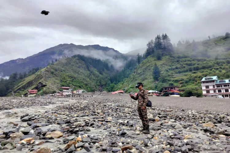 An Army personnel operates a drone to locate stranded civilians following cloudburst, at Dharali in Uttarkashi (file)