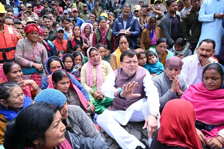 Uttarakhand Chief Minister Pushkar Singh Dhami with rescued villages