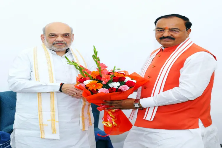  Uttar Pradesh Deputy Chief Minister Keshav Prasad Maurya with Union Home Minister Amit Shah (file)