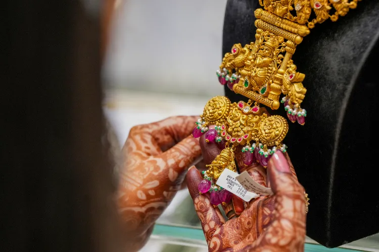 Gold ornaments on display at a jewellery showroom