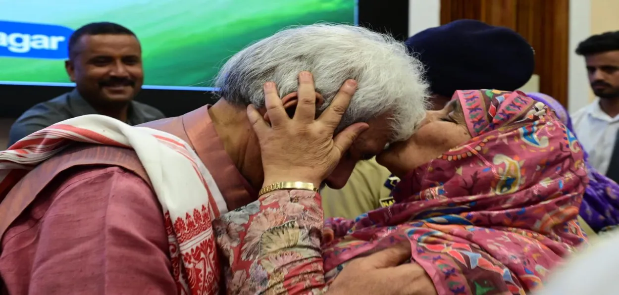 A relative of terror victim kissing LG Manoj Sinha's forehead as a gesture of gratitude