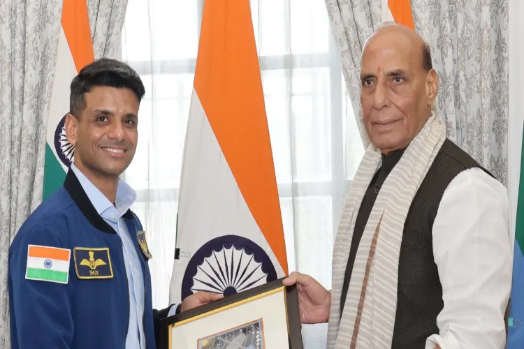 Defence Minister Rajnath Singh with Group Captain Shubhanshu Shukla