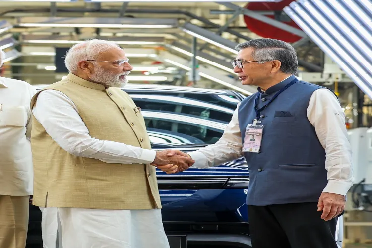 Prime Minister Narendra Modi with President of Suzuki Motors Toshihiro Suzuki 