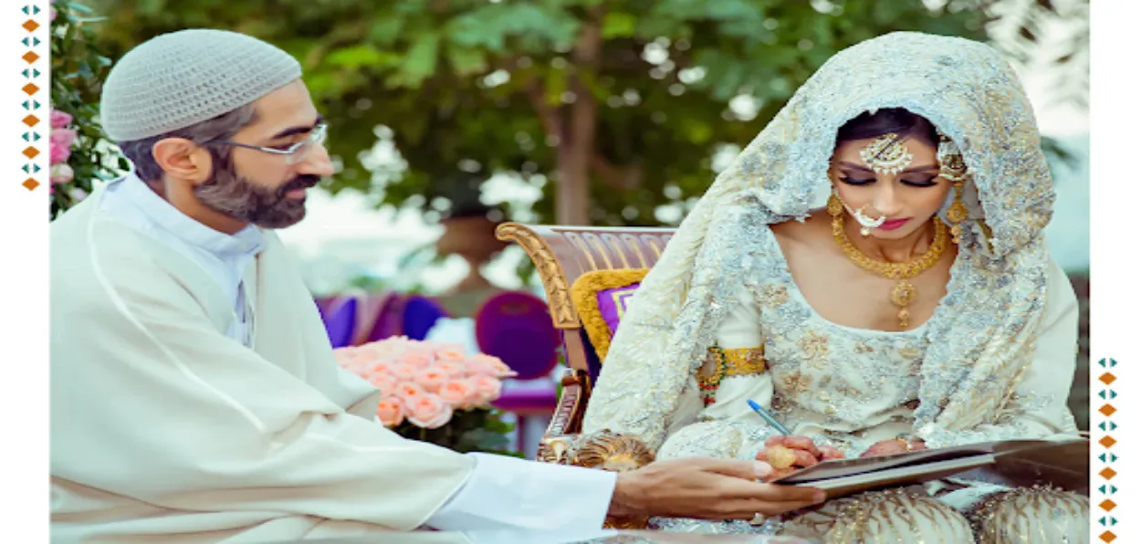 A Muslim couple signing the nikahnama (marriage contract)