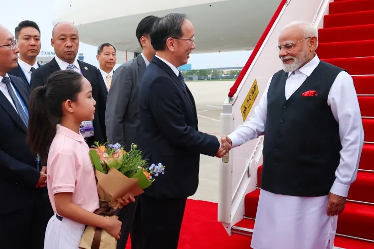 Prime Minister Narendra Modi receiving a welcome at Tianjin , Chna