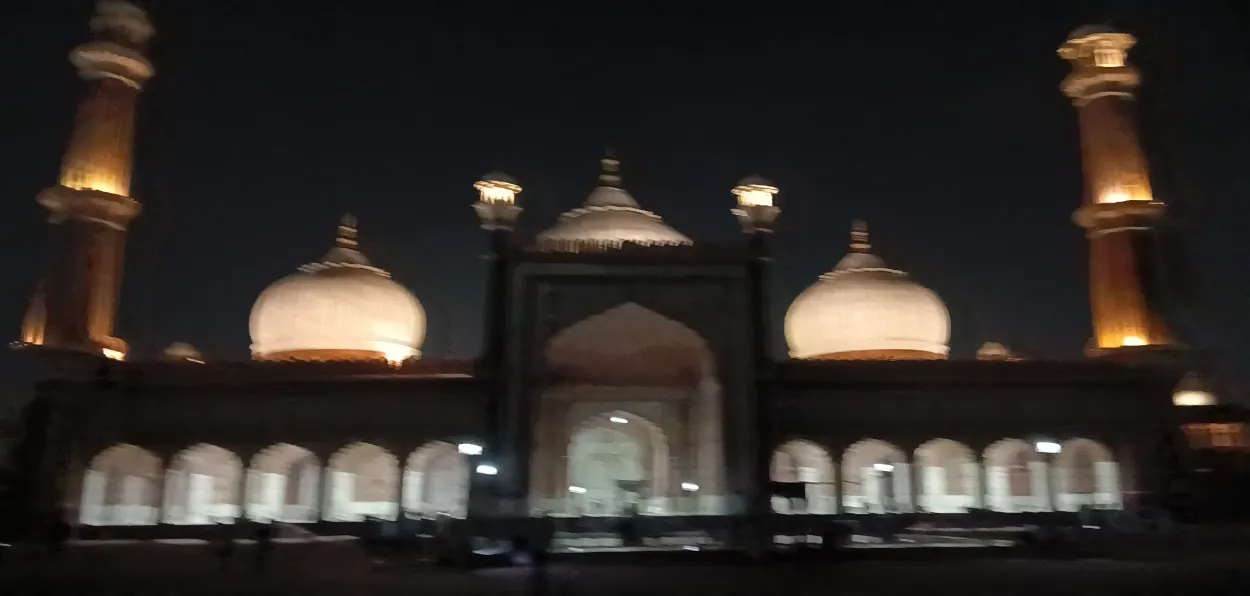 Jamia Masjid illuminated at night