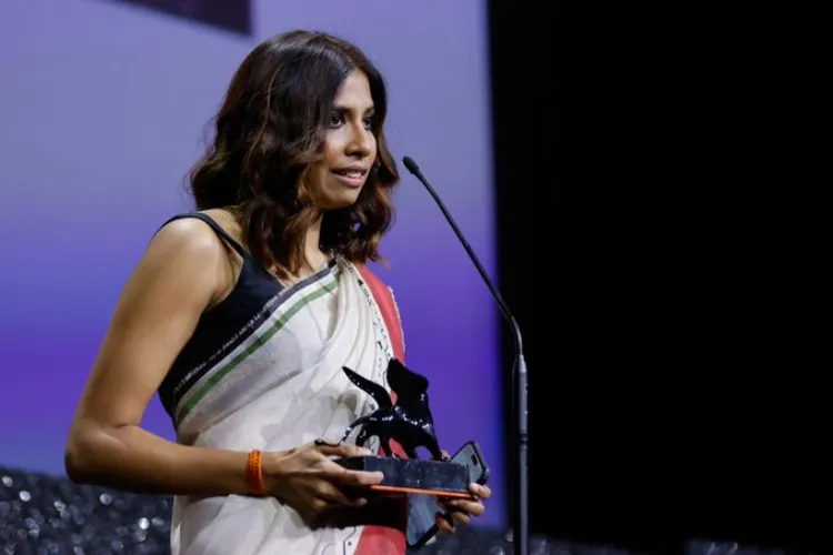 Anuparna Roy with her award