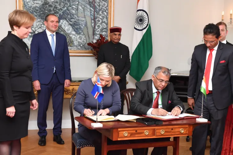 Indian and Iceland officials signing agrements
