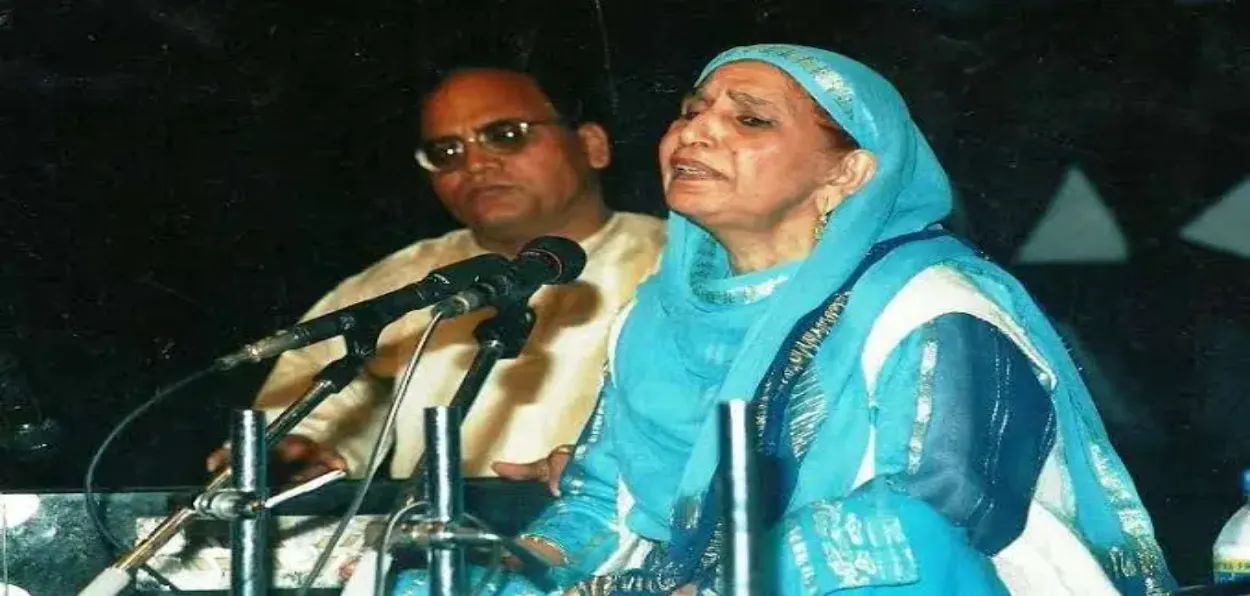Raj Begum singing at a concert