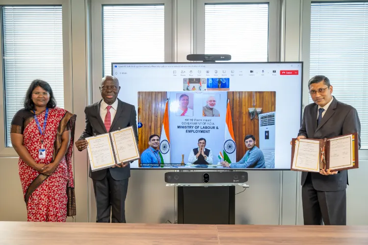 Arindam Bagchi, Ambassador and Permanent Mission of India, Geneva and Gilbert F. Houngbo, Director General, ILO in Geneva, Switzerland
