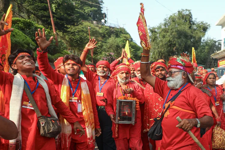 Pilgrims chant religious slogans as they arrive to proceed for Mata Vaishno Devi shrine, at Darshani Deodi, Katra