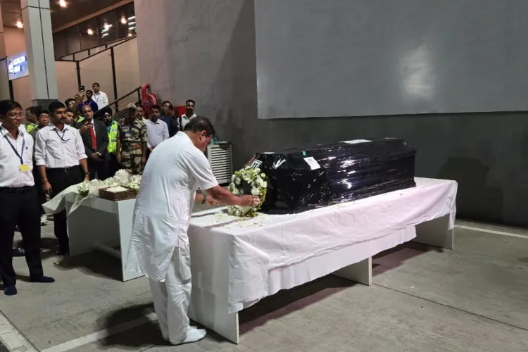Assam CM Himanta Biswa Sarma paying tributes to Zubeen Garg's body at IGIA, Delhi