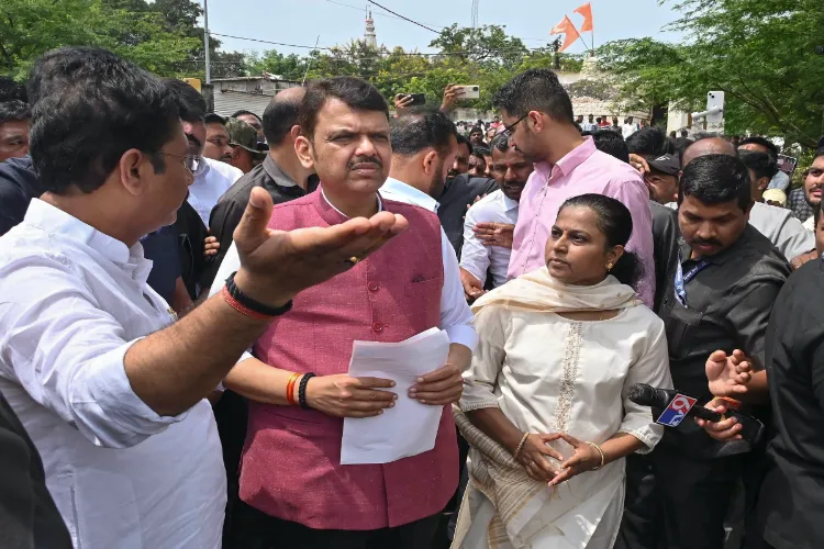 Maharashtra Chief Minister Devendra Fadnavis during inspection of flood-hit areas, in Solapur district