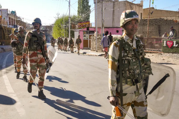 Security force personnel patrolling streets of Leh