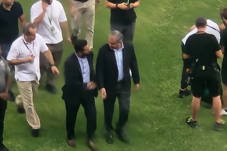 Mohsin Naqvi walking away from the Dubai Stadium
