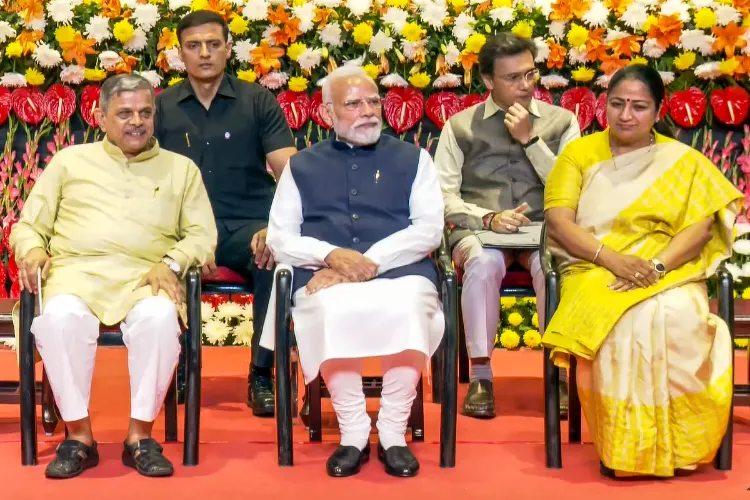  Prime Minister Narendra Modi and Rashtriya Swayamsevak Sangh (RSS) Sarkaryavah Dattatreya Hosabale during the centenary celebrations of the RSS, in New Delhi.
