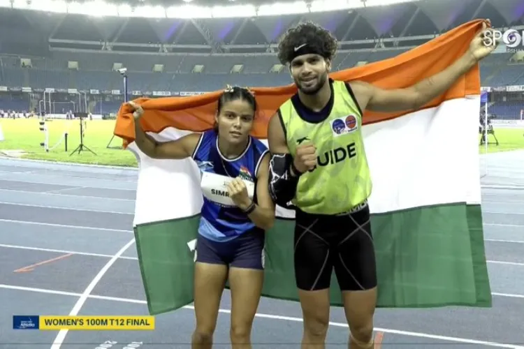 Simran with her coach Umer Sharif after winning gold medal