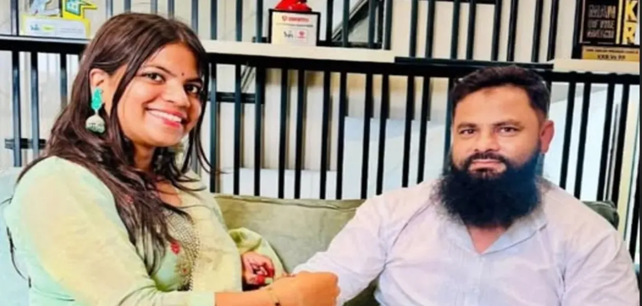 Neha Singh tying Rakhi on the wrist of her Zeeshan Bhai
