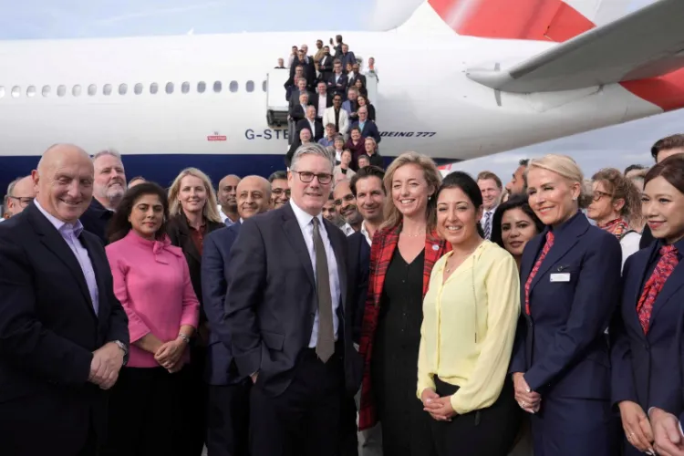 British Prime Minister Keir Starmer with business delegation boarding a plane to New Delhi