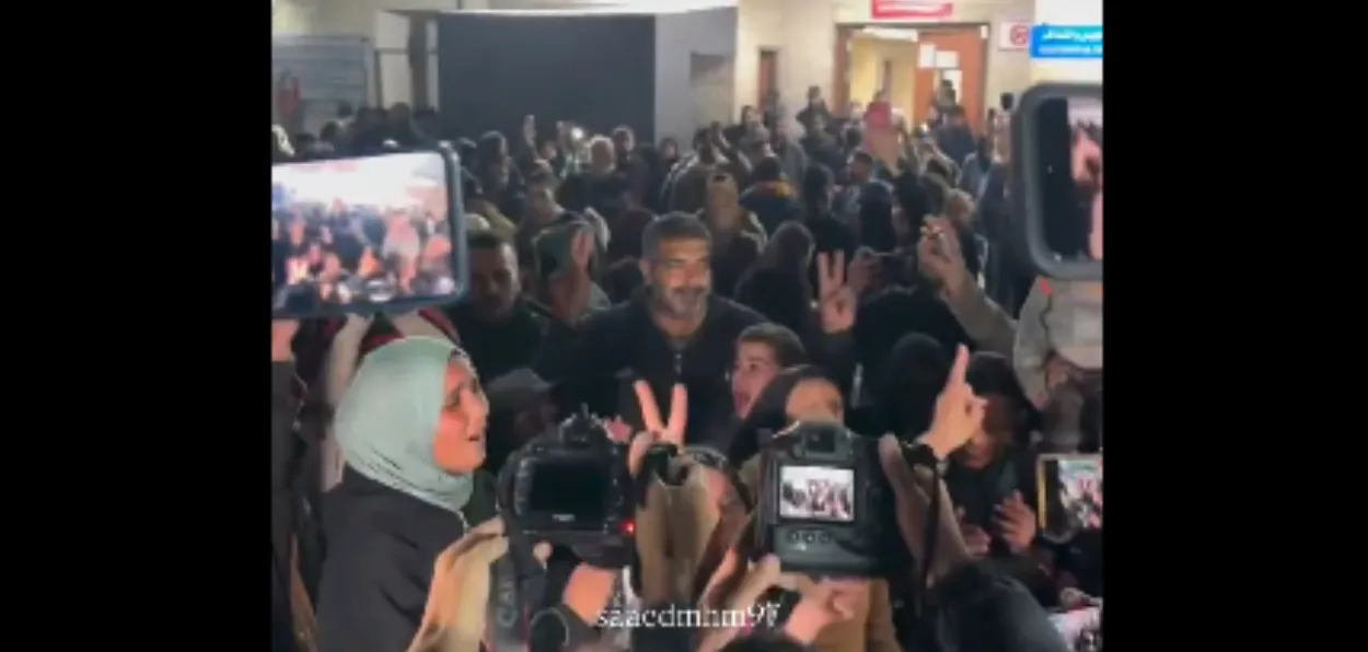 Still photo from video of Gazans celebrating the announcement of ceasefire