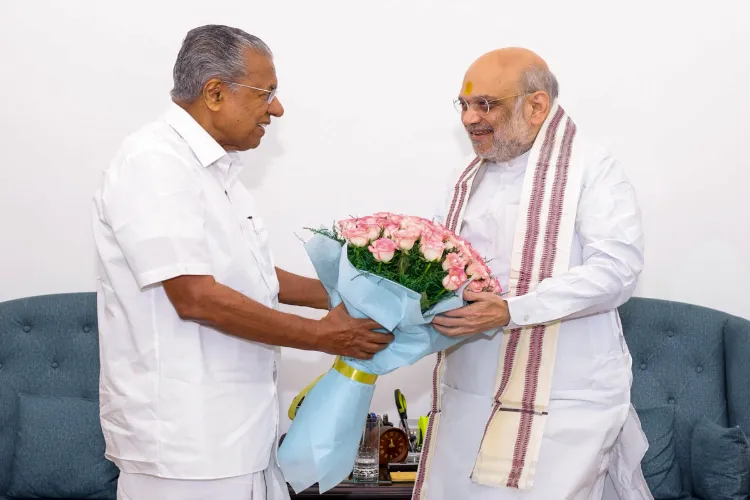 Union Home Minister Amit Shah with Kerala Chief Minister Pinarayi Vijayan during a meeting