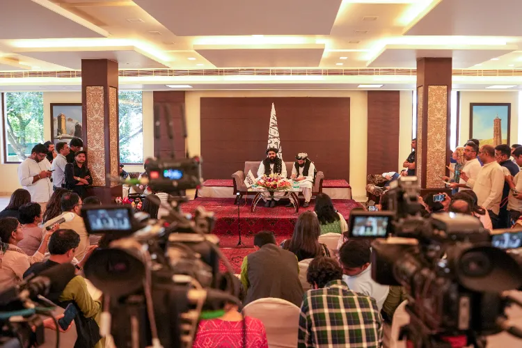 Media representatives gather during Afghanistan Foreign Minister Amir Khan Muttaqi's press conference