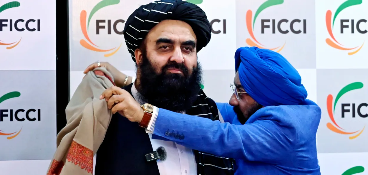 Afghanistan's foreign Minister Amir Khan Muttaqi being felicitated at FICCI, New Delhi