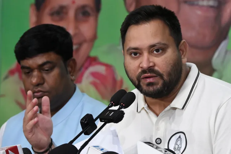 Patna: RJD Leader of Opposition Tejashwi Yadav addresses a press conference at his official residence