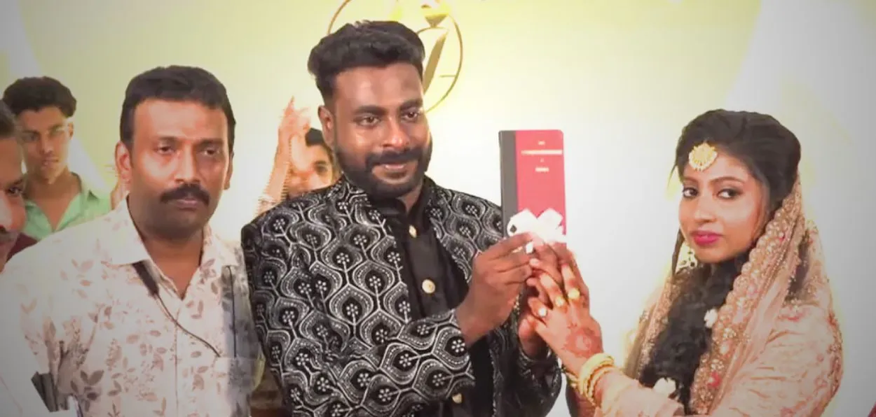 Jabirul Hasan and Asina gifting the Copy of the Constitution to each other