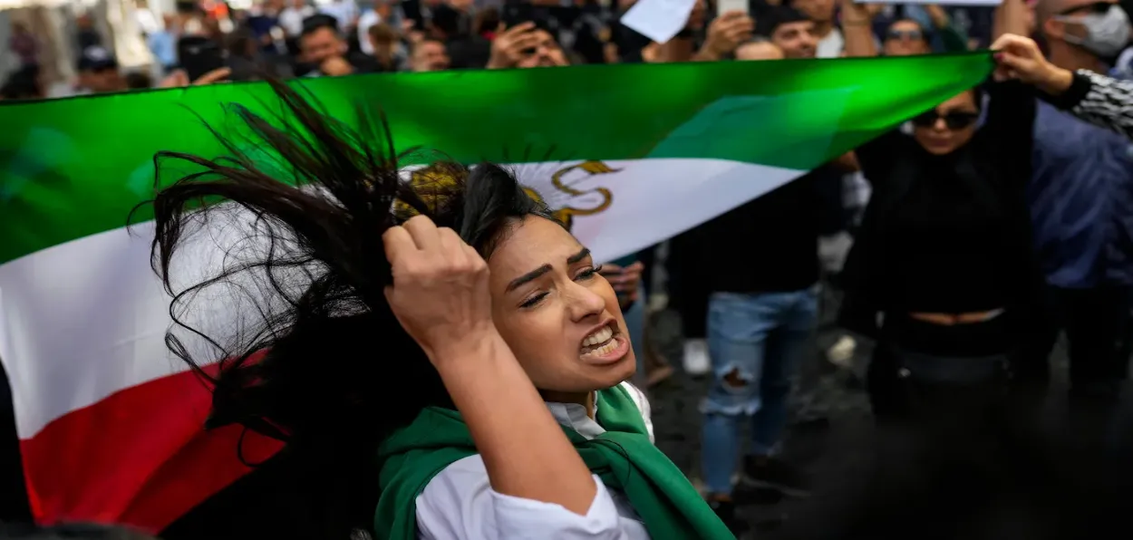 An Iranian woman during a protest against mandatory Hijab