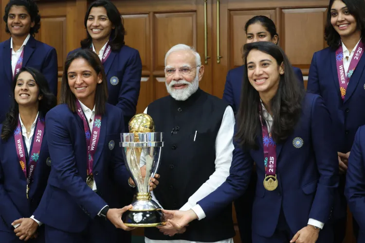 Prime Minister Narendra Modi with cricketers, including Renuka Singh (On PM's left)