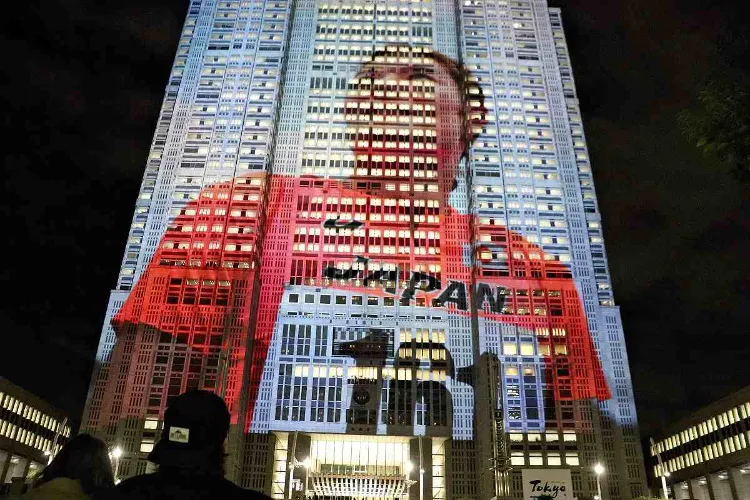 Singns to be used during para Olypics for def on display in Tokyo on a building