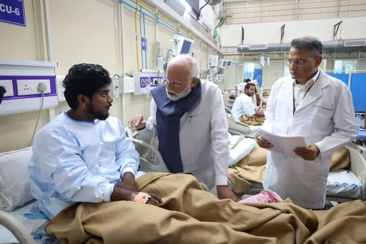 Prime Minister Narendra Modi meeting a person injured in the Red Fort blast in LNJP hospital